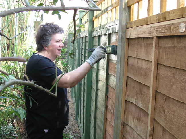 Clare gets busy with her paintbrush